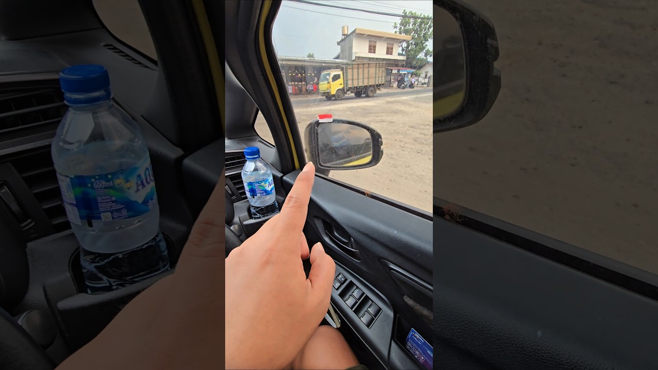 itu yang nempel dikaca spion mobil otong apa sih?#trendingshorts