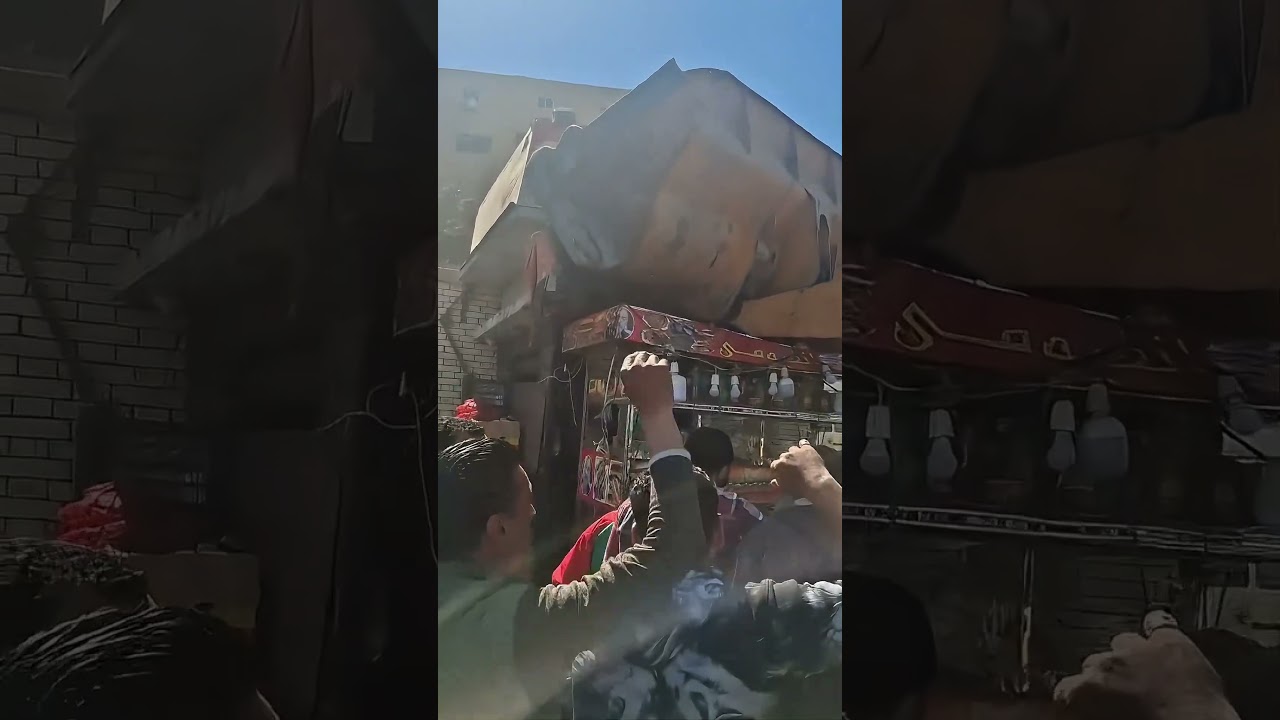 صاحب عربة مأكولات مخالف يفاجئ الجميع 🚨 ويقف أمام اللودر لمنع أجهزة الحي من إزالتها لمضايقته المارة