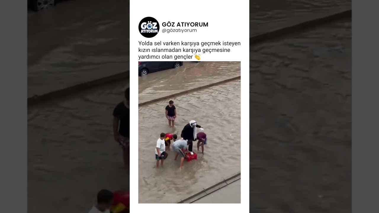 Yolda sel varken karşıya geçmek isteyen kızı ıslanmadan karşıya geçiren gençler 👏