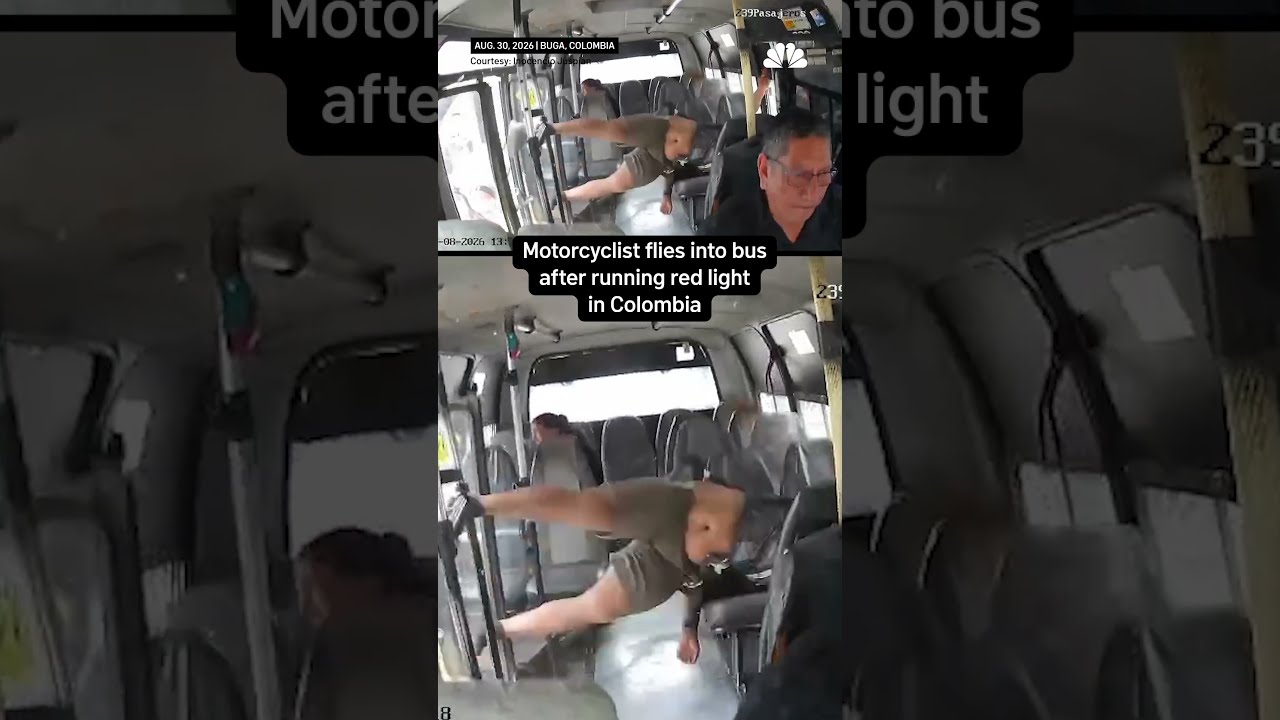 Motorcyclist flies into bus after running red light in Colombia