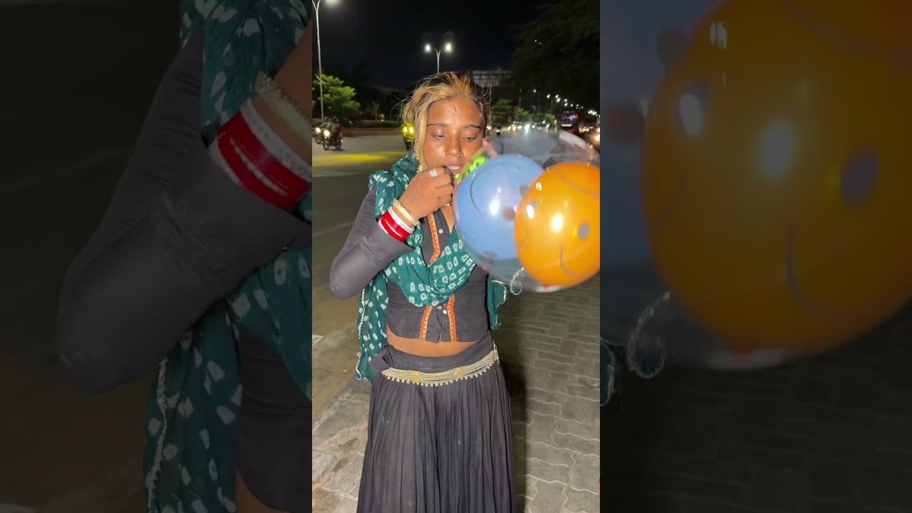 A beautiful girl's amazing balloon-inflating skill.