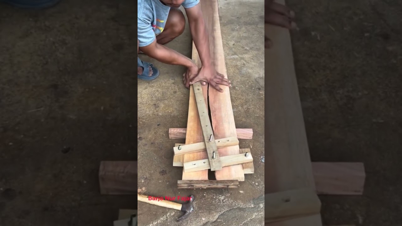 this indonesian carpenter create a tool to help in clamping split wooden board with just scrap